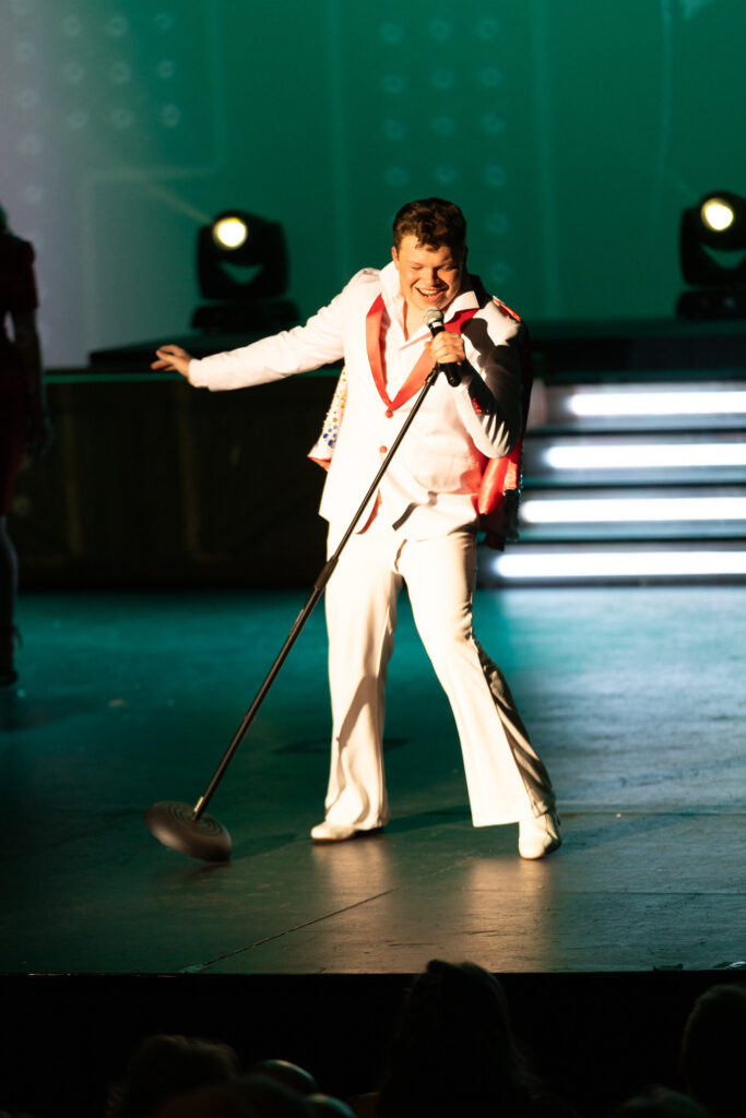 Elvis on stage with mic stand